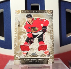 Taylor Raddysh 2024-25 - Gold Materials Dual Jersey /299 Artifacts Upper Deck